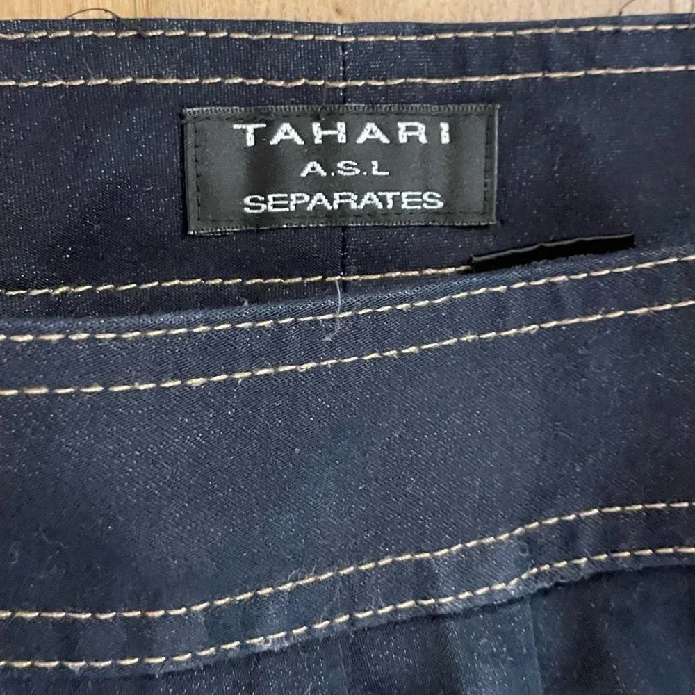 Tahari navy blue wide-legged pants.